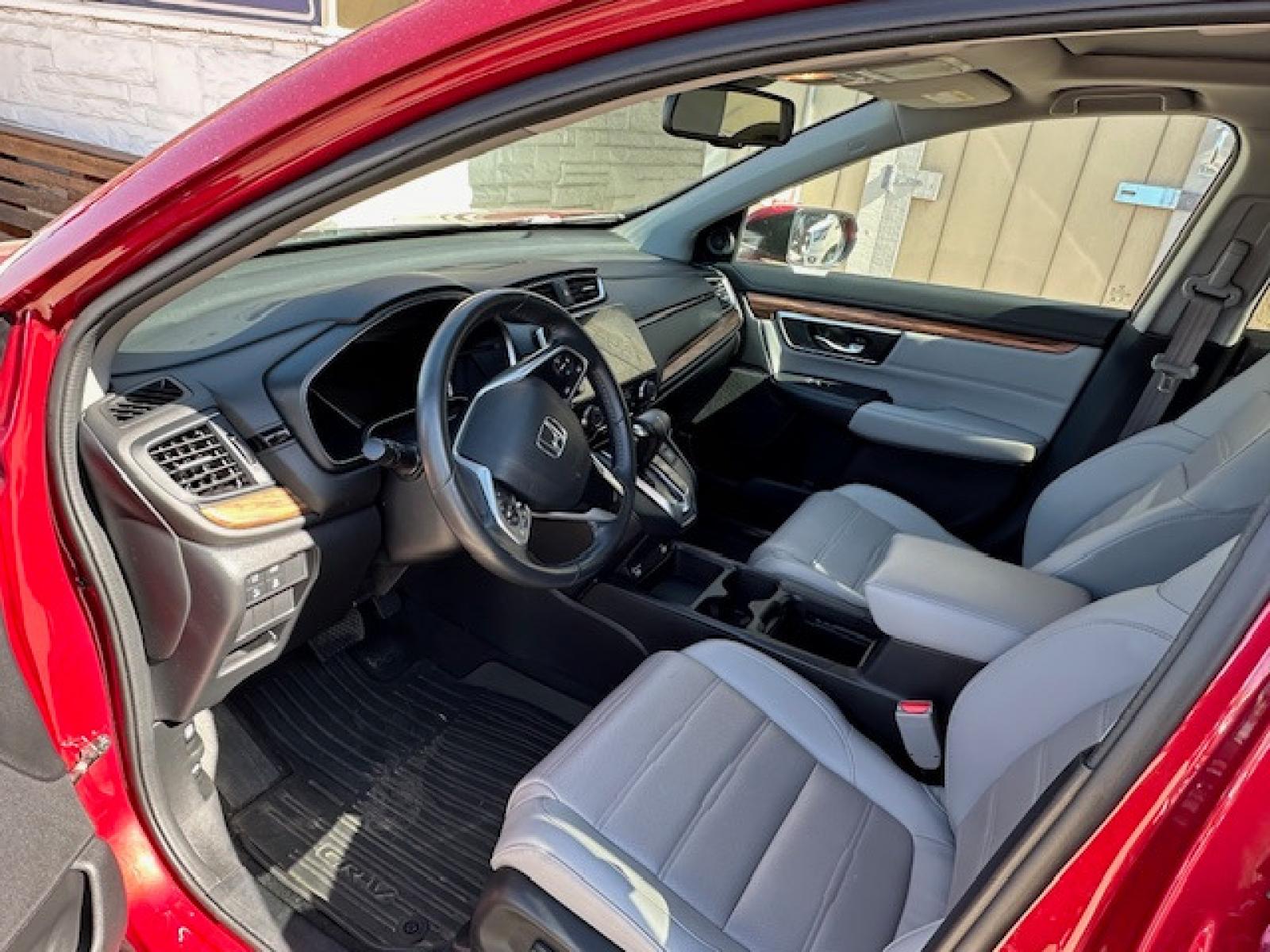 2020 Red /Gray Leather Honda CR-V EX-L AWD (5J6RW2H89LA) with an 1.5L L4 16V DOHC TURBO engine, CVT transmission, located at 3200 1st Avenue North, Billings, MT, 59101, (406) 245-9055, 45.779270, -108.510742 - Super Sharp Off Leased SUV. EX-L Package with Power Moon Roof, Leather Interior, Power Seats, Upgraded Sound System, Never Smoked In and Only 27,000 Miles! CarFax Dealer. Auto Brokers of Montana/AA&A Auto Rental/Fox Car Rental Billings - Photo #2